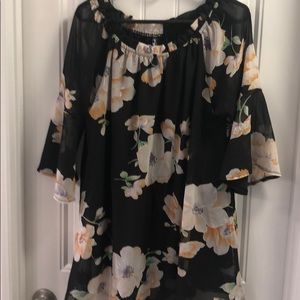 Floral and black fully lined blouse.